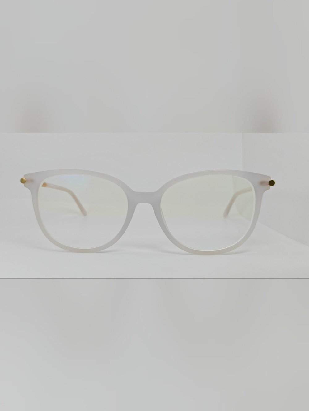 Cylinder. Women's Frosted White Round Frame Glasses. Cylinder Gold Highlights.